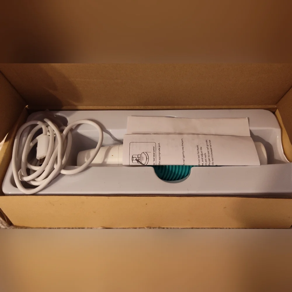 White and Teal Hair Clipper